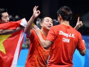 China's men's coach Liu Guoliang (central) celebrates with team members Zhang Jike and Xu Xin - Photo courtesy of ITTF / by Konno Noboru China's men's coach Liu Guoliang (central) celebrates with team members Zhang Jike and Xu Xin - Photo courtesy of ITTF / by Konno Noboru